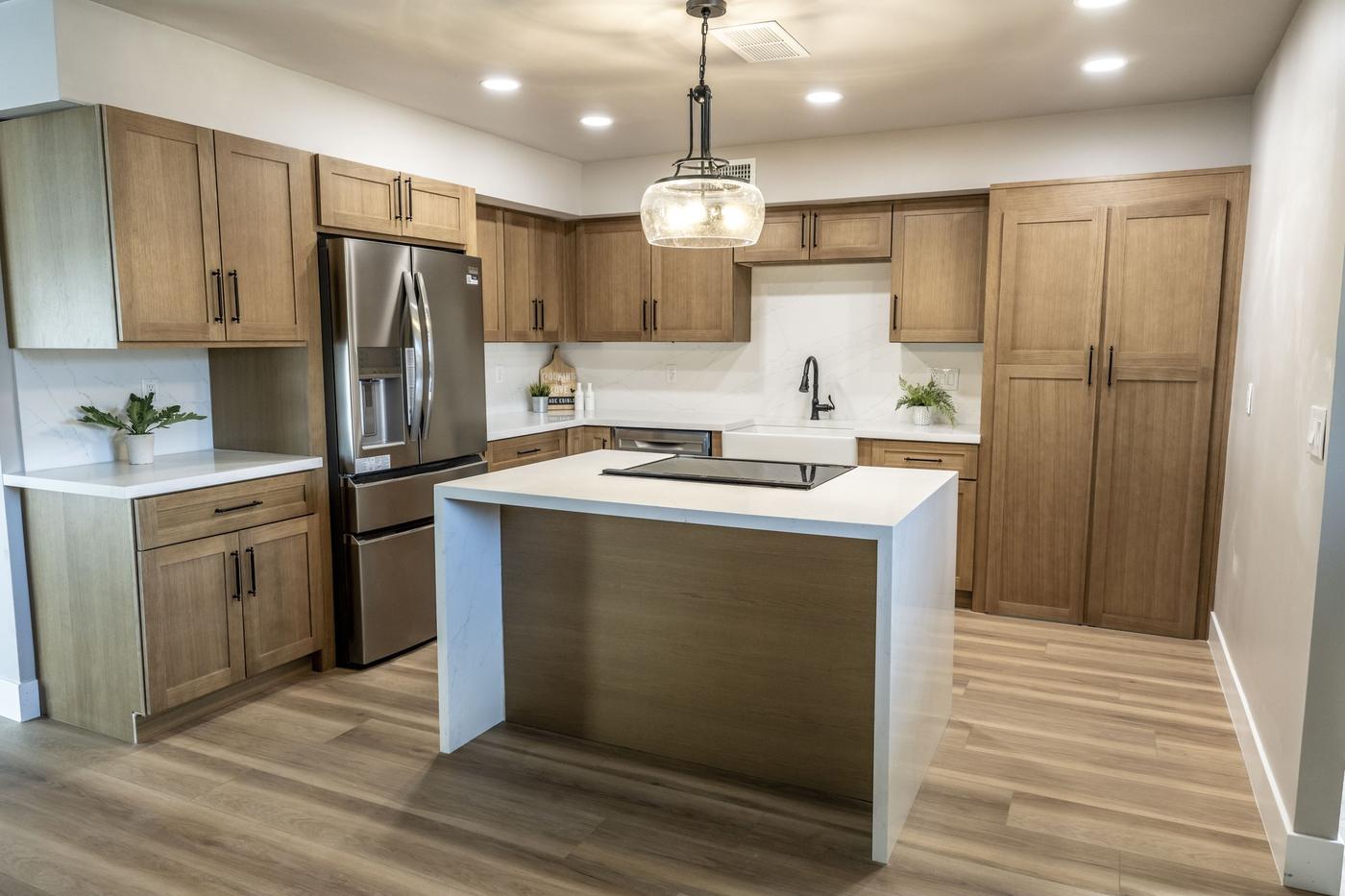 Kitchen with waterfall quartz island