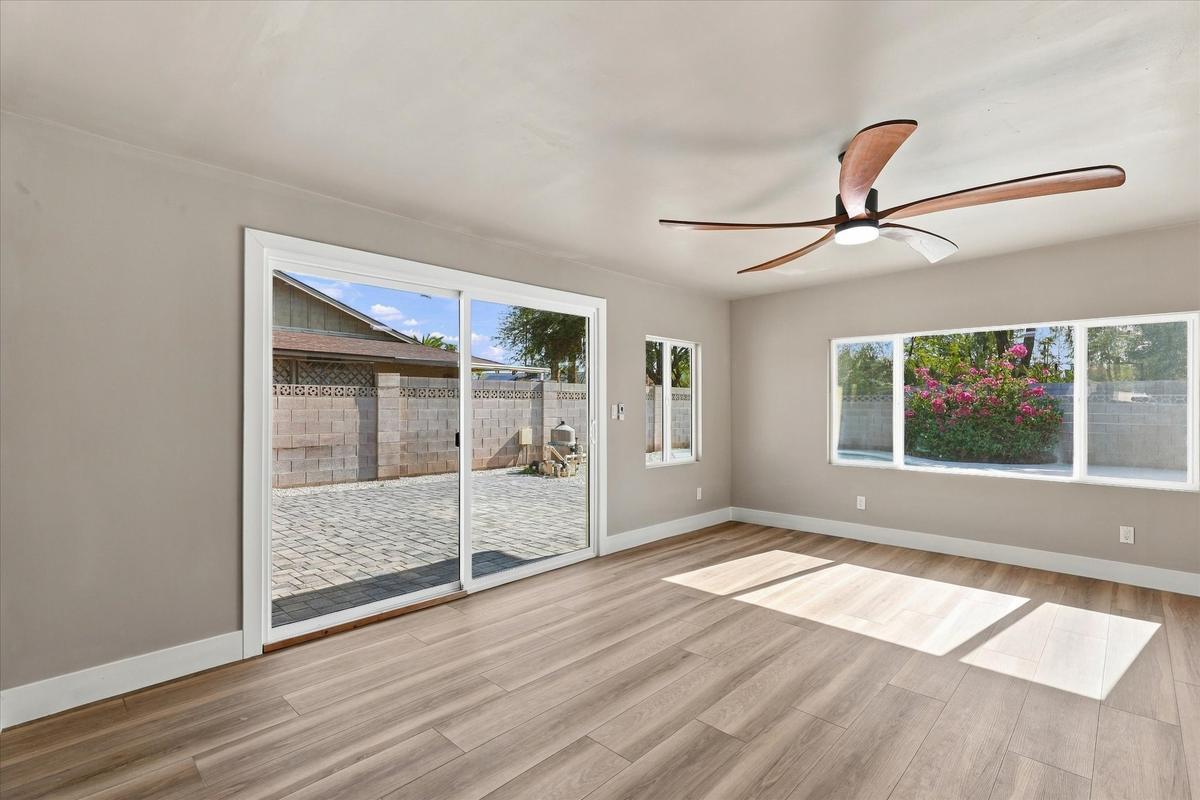 Living room with slider to the backyard